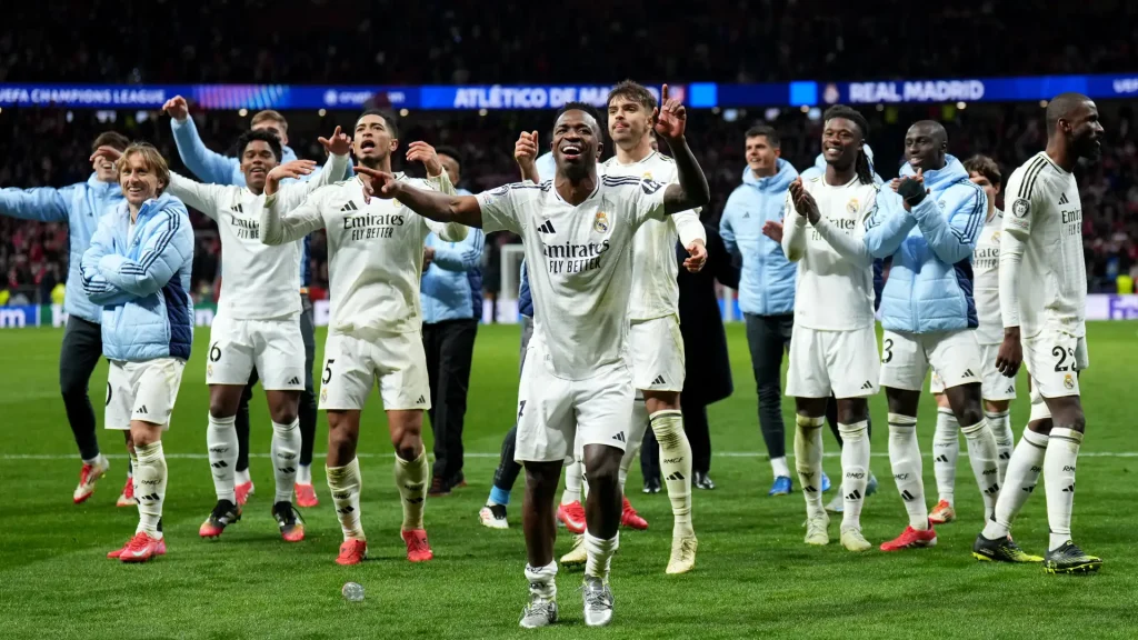 Vinicius Junior  celebrates victory with teammates after Real Madrid defeat Atletico de Madrid (Photo Credit: Getty)