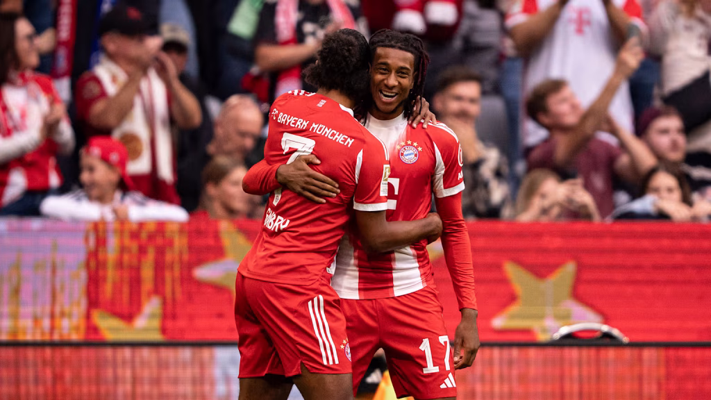 Olise created an assist in Bayern's five goal thirller. (Credit: Bayern Munich media).