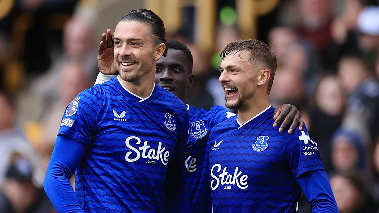 Jack Grealish celebrates a goal with teammates. photo credit: Everton Media