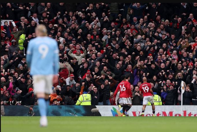 Bryan Mbeumo celebrates. (Photo Credit: Manchester United Media).