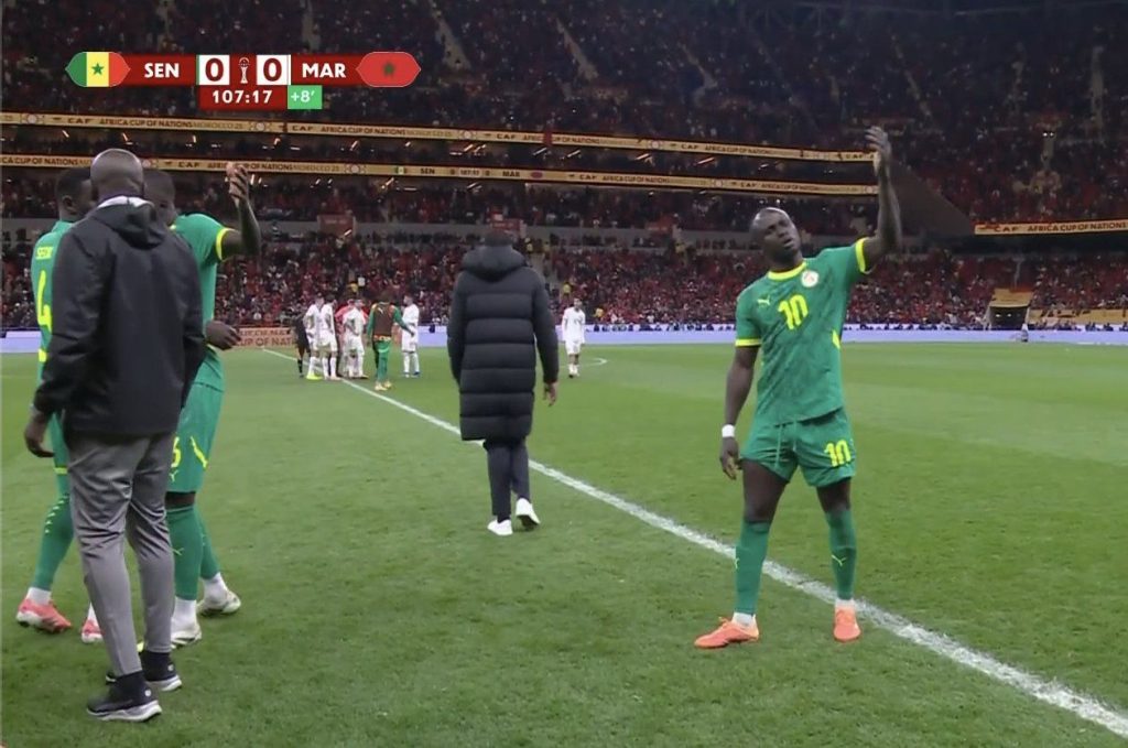 SADIO MANE IS NOW BEGGING HIS TEAMMATES TO GET BACK ON THE PITCH AND FINISH THE GAME - Photo Credit : Derek Katey Caesar, Facebook