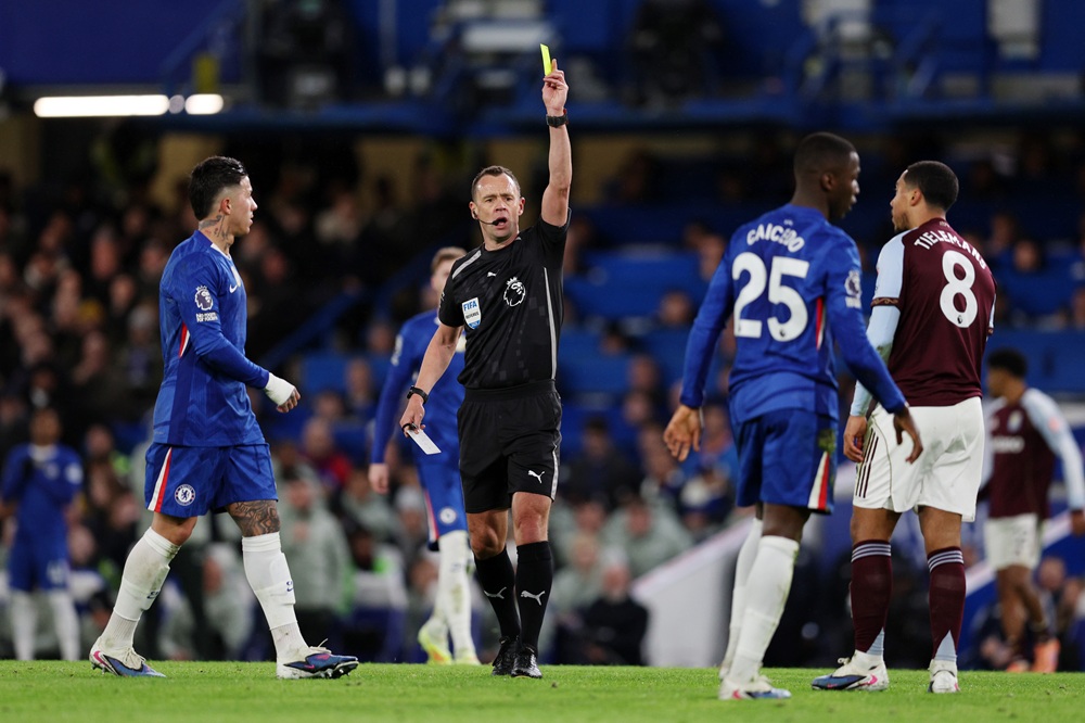 moisés caicedo receiving yellow card - Photo Credit : theguardian official Website