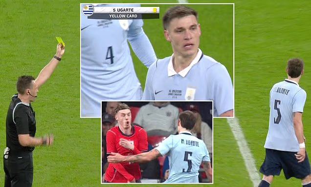 Farcical refereeing decision sees Man United star escape red card despite being brandished TWO yellow cards in England's draw with Uruguay at Wembley - Photo Credit : DailyMail