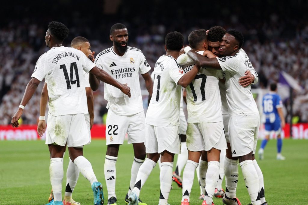 Real madrid celebrating. (photo credit: Reaal madrid media)