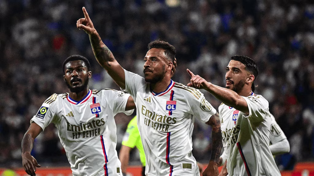 Lyon celebrating. (photo credit: arsenal media)