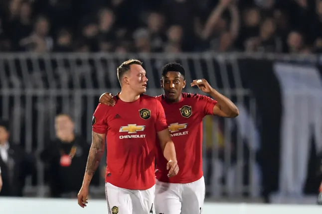 Jones and Martial (Photo Credit: Getty)