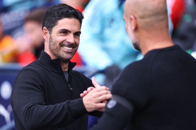 Pep Guardiola & Mikel Arteta (photo credit: Getty)