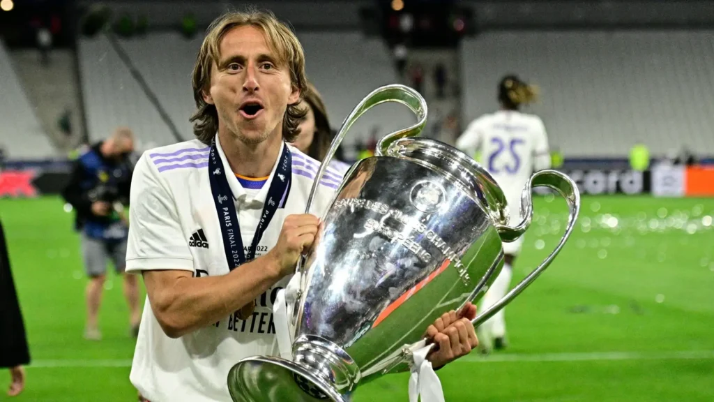 Modric Winning UEFA Champions League (Photo Credit - Goal)