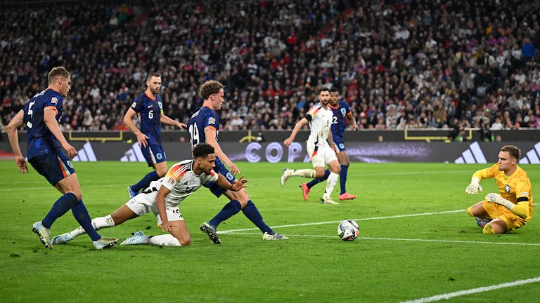 Germany's Kevin Schade in action with Netherlands' Mats Wieffer - Photo Credit : REUTERS
