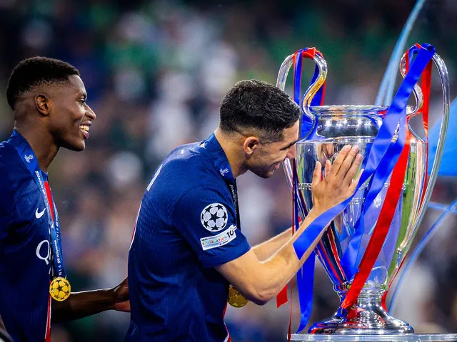 Achraf Hakimi and Nuno Mendes after the 2025 UCL final triumph (Photo Credit: Uefa website)