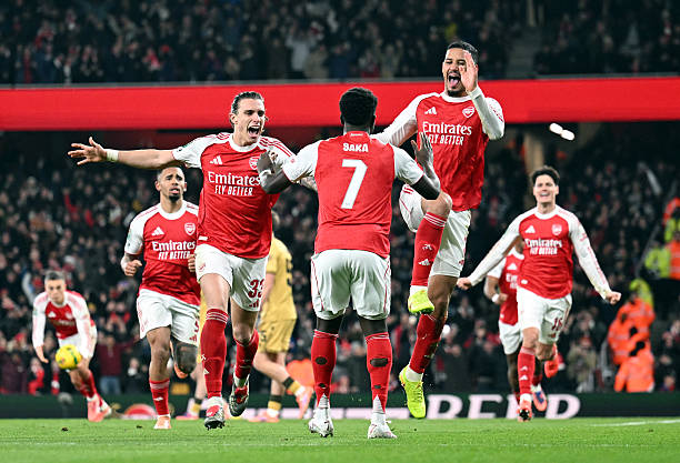 Arsenal Players celebrate after scoring (Photo Credit: Arsenal website)