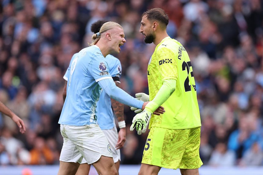 MANCHESTER, ENGLAND - SEPTEMBER 14: Gianluigi Donnarumma of Manchester City is congratulated by Erling Haaland after making a save during the Premier League match between Manchester City and Manchester United at Etihad Stadium on September 14, 2025 in Manchester, England. (Photo by Alex Livesey - Danehouse/Getty Images)