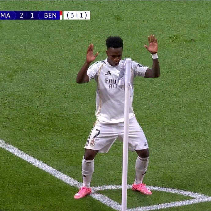 Vinicius jr dancing in front of Benfica fans after scoring the winning goal, in Real Madrid 2:1 win over Benfica in the second leg of the Champions league playoffs