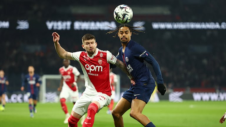 Paris St Germain's Bradley Barcola in action with AS Monaco's Caio Henrique - Photo Credit : Reuters
